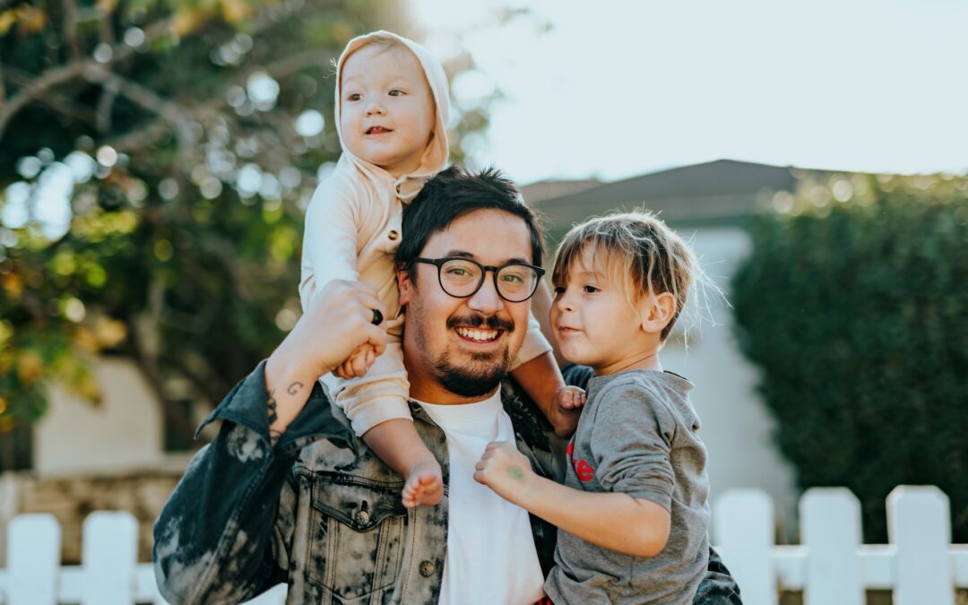 Loving dad with two small children